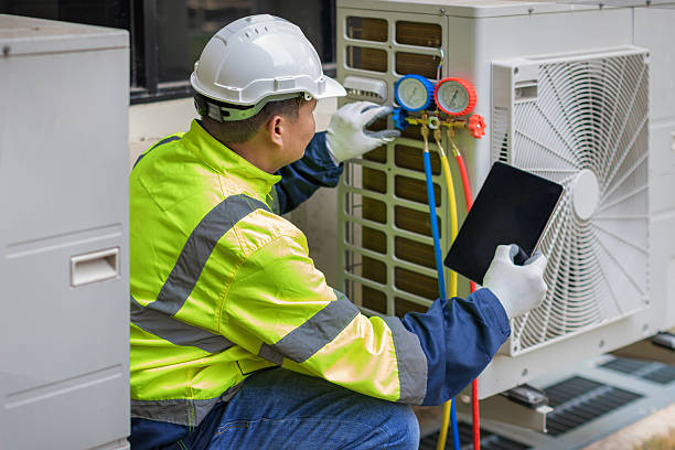 Professional Hvac technician working in Alamo, NV